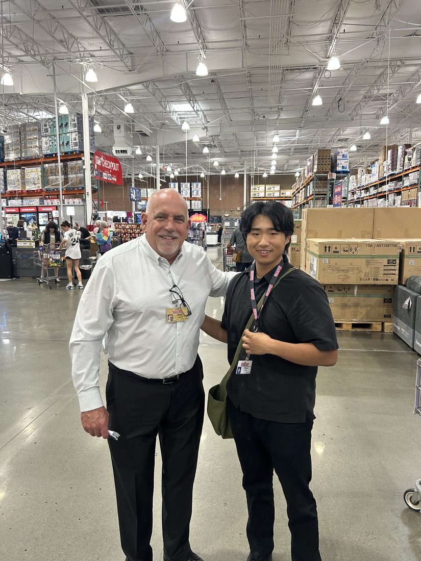 Oliver Lim with Costco President and CEO Ron Vachris